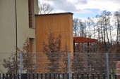 Ukázka fasády rodinného domu s dřevěném obkladem. RD České Budějovice - Jasmínova, Parklex